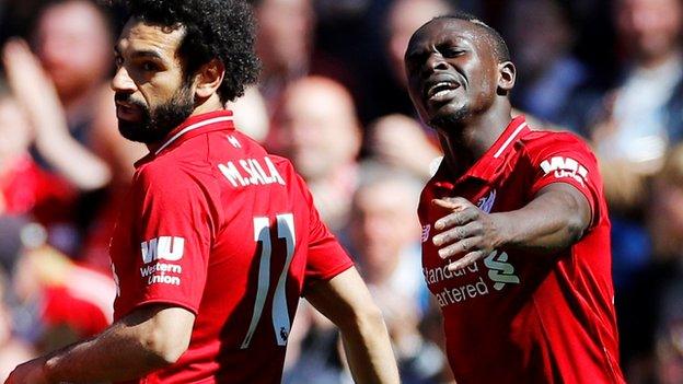 Mohamed Salah and Sadio Mane of Liverpool after Mane had scored his goal in the first half