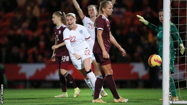 Alessia Russo celebrates scoring for England