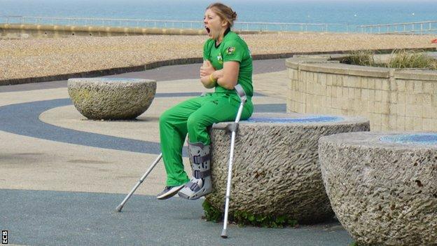 Heather Knight - on crutches with a moon boot