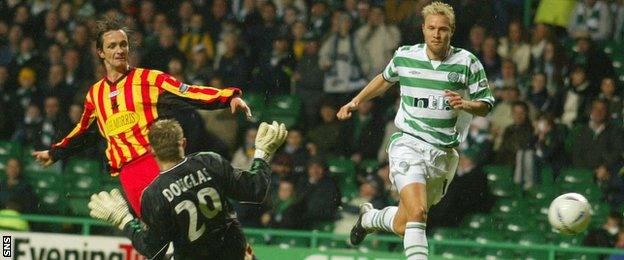 Gerry Britton in action for Partick Thistle against Celtic