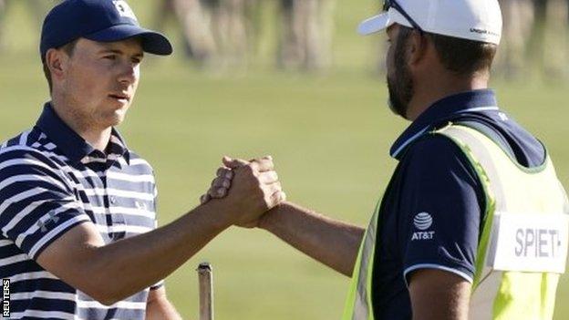 Jordan Spieth and his caddie Michael Greller at the end of the Waste Management Pheonix Open in Arizona