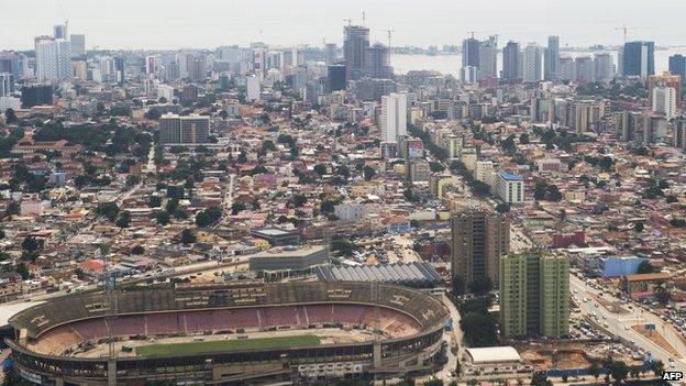 The skyline of central Luanda, Angola, with the 'Estadio da Cidadela' stadium in foreground