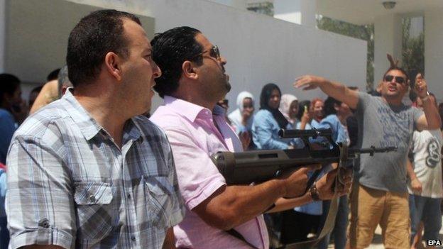 police control crowds in Sousse