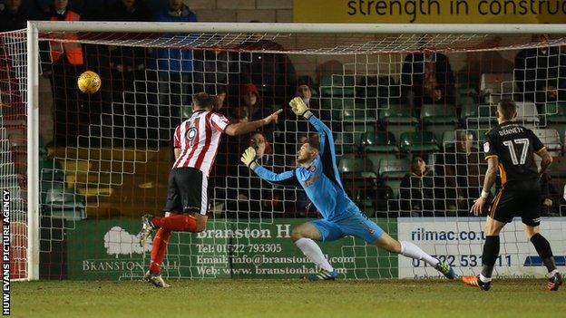 Matt Rhead headed Lincoln into an early lead at Sincil Bank