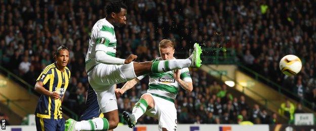 Celtic's Efe Ambrose clears the ball against Fenerbahce