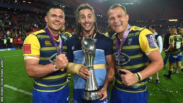 Ellis Jenkins, Josh Navidi and Olly Robinson celebrate with the European Challenge Cup trophy in Bilbao