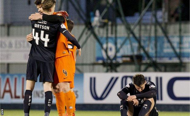 Mark Durnan offers consolation to Falkirk's Paul Watson at full-time