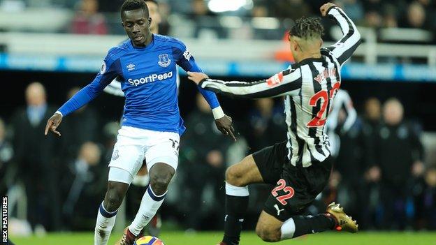 Idrissa Gueye and DeAndre Yedlin challenge