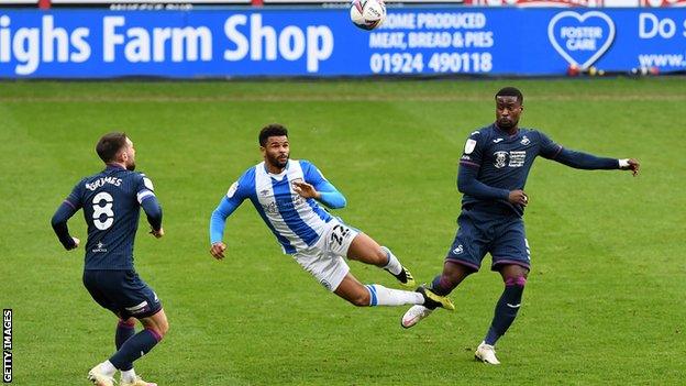 Frazier Campbell challenges for ball