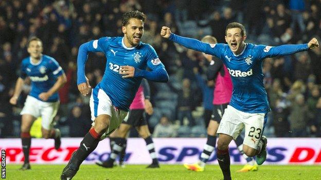 Harry Forrester celebrates his late goal at Ibrox