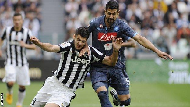 Ex-Napoli Miguel Britos tackles Alvaro Morata of Juventus