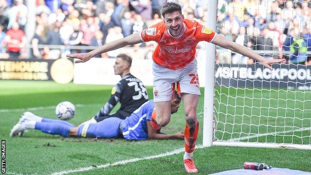 Blackpool's Jake Beesley scores his first goal for the club against Birmingham