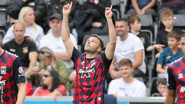 Coventry forward Matty Godden celebrates his third goal of the season