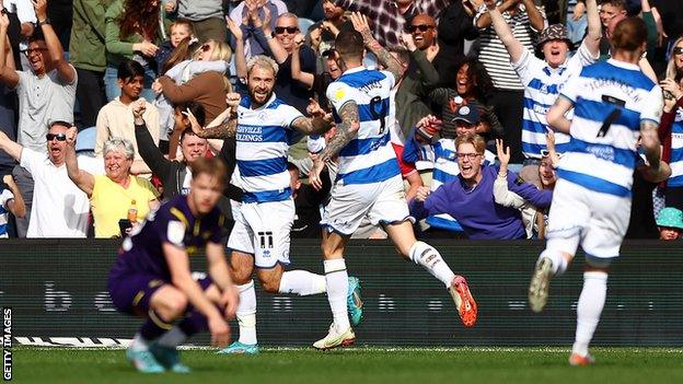 Charlie Austin celebrates scoring for QPR