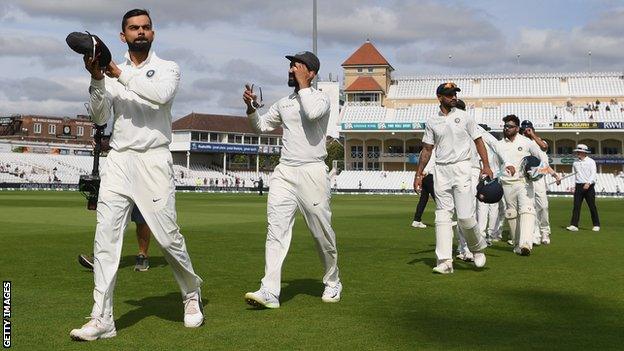 Virat Kohli leads his players from the field after victory at Trent Bridge