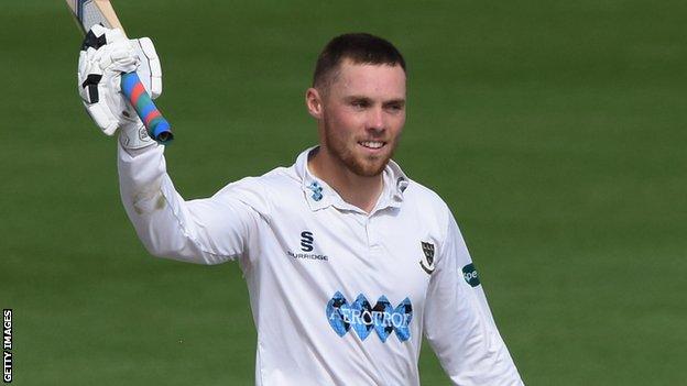 Sussex batsman Phil Salt celebrates his century