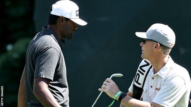 American Sahith Theegala and his caddie Michael Beard