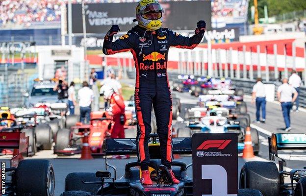 Red Bull's Max Verstappen celebrates after winning the 2019 Austrian Grand Prix