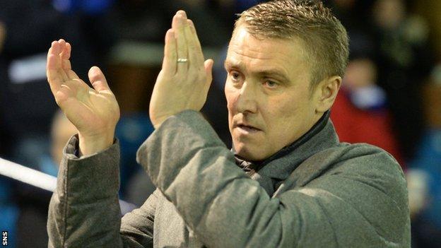 Kilmarnock boss Lee Clark applauds his team's fans