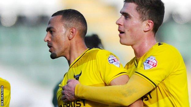 Kemar Roofe celebrates at Plymouth