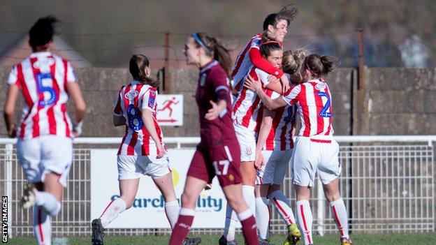 Stoke City women celebrate a goal against Aston Villa