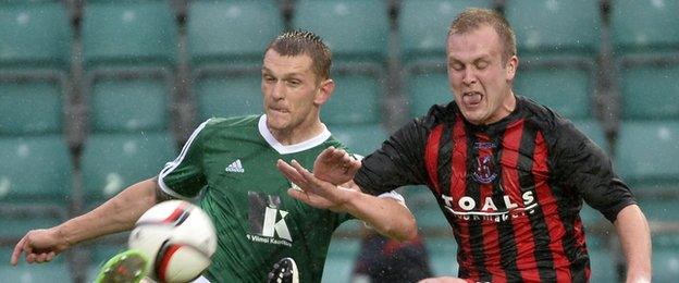 Ingemaar Teever of Levadia competes for the ball against Jordan Owens of Crusaders