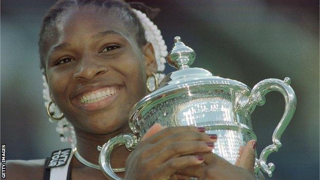 Serena Williams holds the US Open trophy in 1999