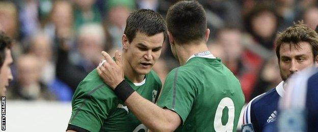 Ireland's Johnny Sexton and Conor Murray discuss tactics in a match against France