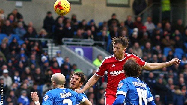 Danny Collins scores for Forest against Brighton last season