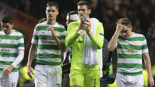 Celtic defender Mikael Lustig, goalkeeper Craig Gordon and winger James Forrest