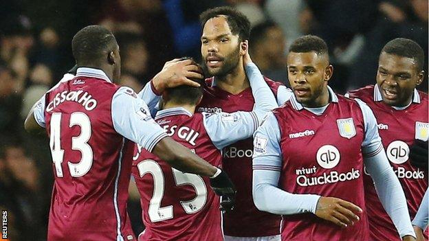 Aston Villa players celebrate taking the lead against Crystal Palace