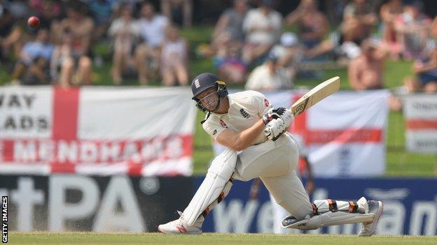 England batsman Jos Buttler plays a sweep shot against Sri Lanka