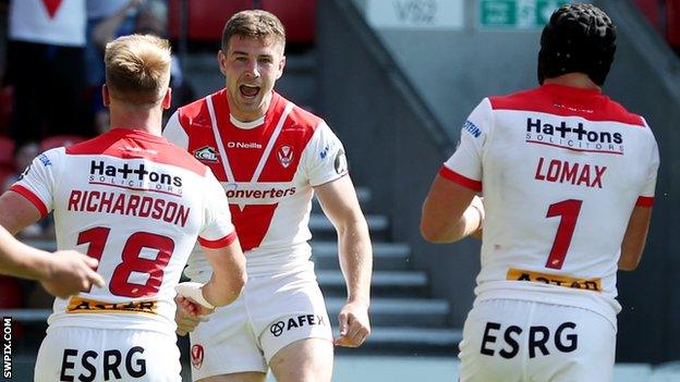 St Helens celebrate a try