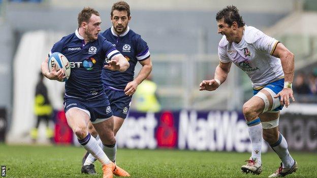 Stuart Hogg playing for Scotland against Italy