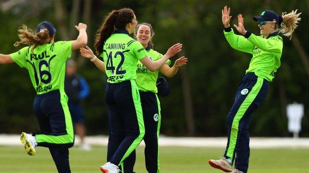 Ireland celebrate taking a Scotland wicket but the game would end in defeat for the hosts