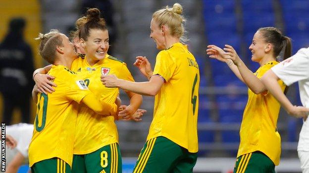 Jess Fishlock celebrates with Wales team-mates after scoring against Kazakhstan