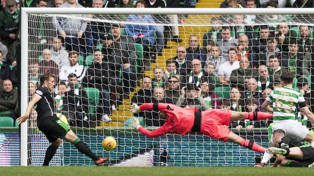 Craig Gordon pulls off a diving save to deny a close range effort from Seven Whittaker