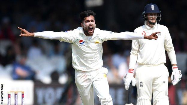 Pakistan fast bowler Mohammad Amir celebrates taking a wicket in a Test against England in 2018