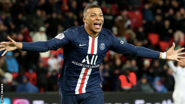 Kylian Mbappe celebrates scoring for PSG