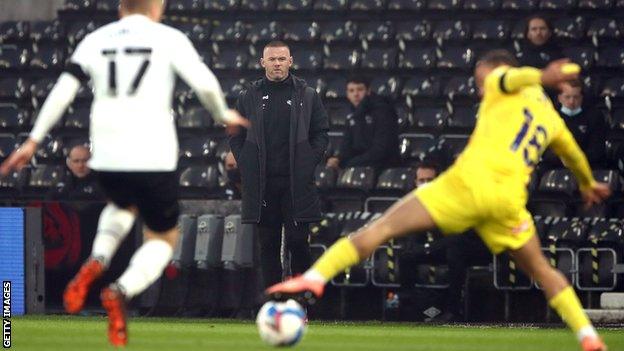 Wayne Rooney on the sideline as caretaker Derby manager