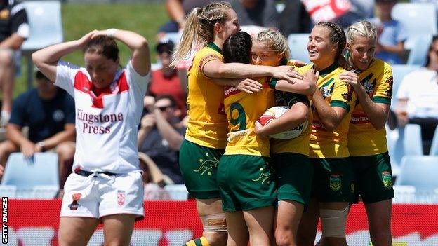 Australia celebrate scoring against England