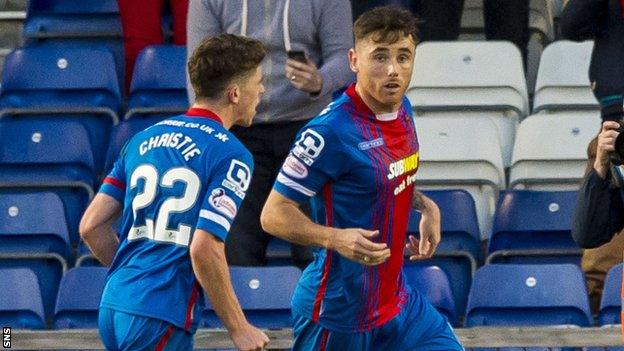 Inverness Caley Thistle's Ryan Christie congratulates scorer Greg Tansey