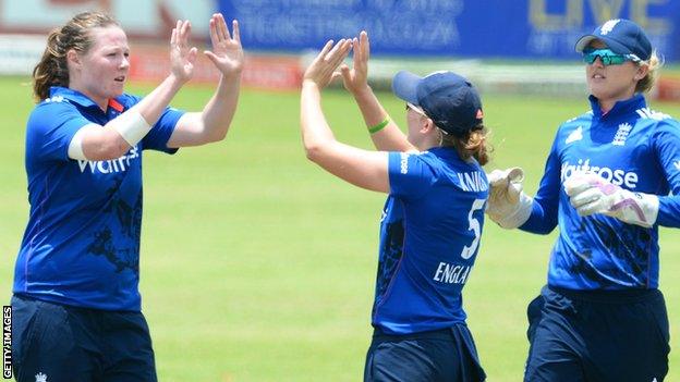 Anya Shrubsole (left) celebrates a wicket