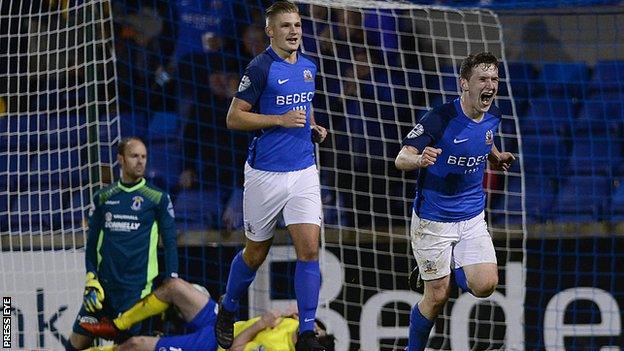 Bobby Burns celebrates