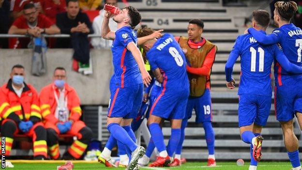 Declan Rice took a drink from a cup thrown at Raheem Sterling