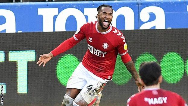 Kasey Palmer celebrates after scoring directly from a corner in Bristol City's win at Swansea