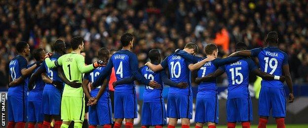 France players during a minute's silence before their game with Russia