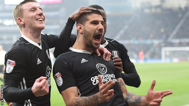 Aleksandar Mitrovic celebrates scoring the opening goal against Derby