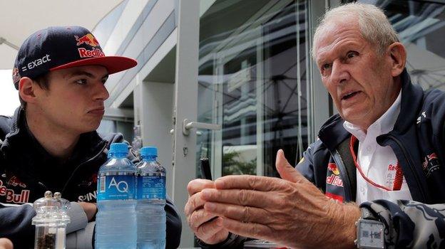 Max Verstappen speaking to Red Bull's head of driver development programme Dr Helmut Marko at the Russian Grand Prix