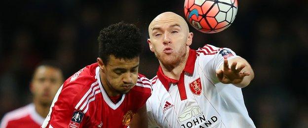 Conor Sammon (right) in action for Sheffield United against Manchester United